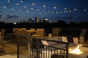String outdoor commercial lighting on Chicago rooftop